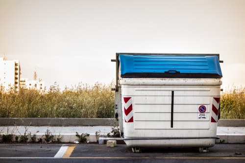Various types of business waste including paper and electronics.